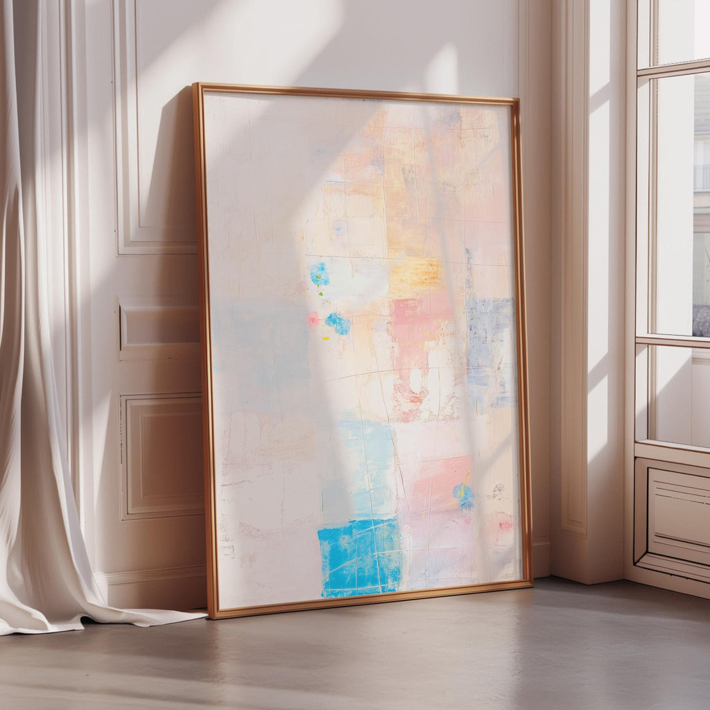 a large abstract painting with a mix of pastel colors and geometric shapes, displayed on a white wall in a room with a window.