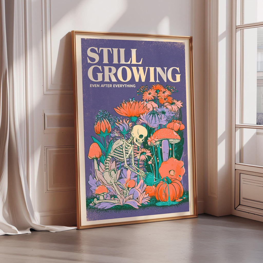 a poster with a skeleton and various colorful flowers and mushrooms. The poster has a purple background and the text "STILL GROWING" and "EVER AFTER EVERYTHING" written on it.