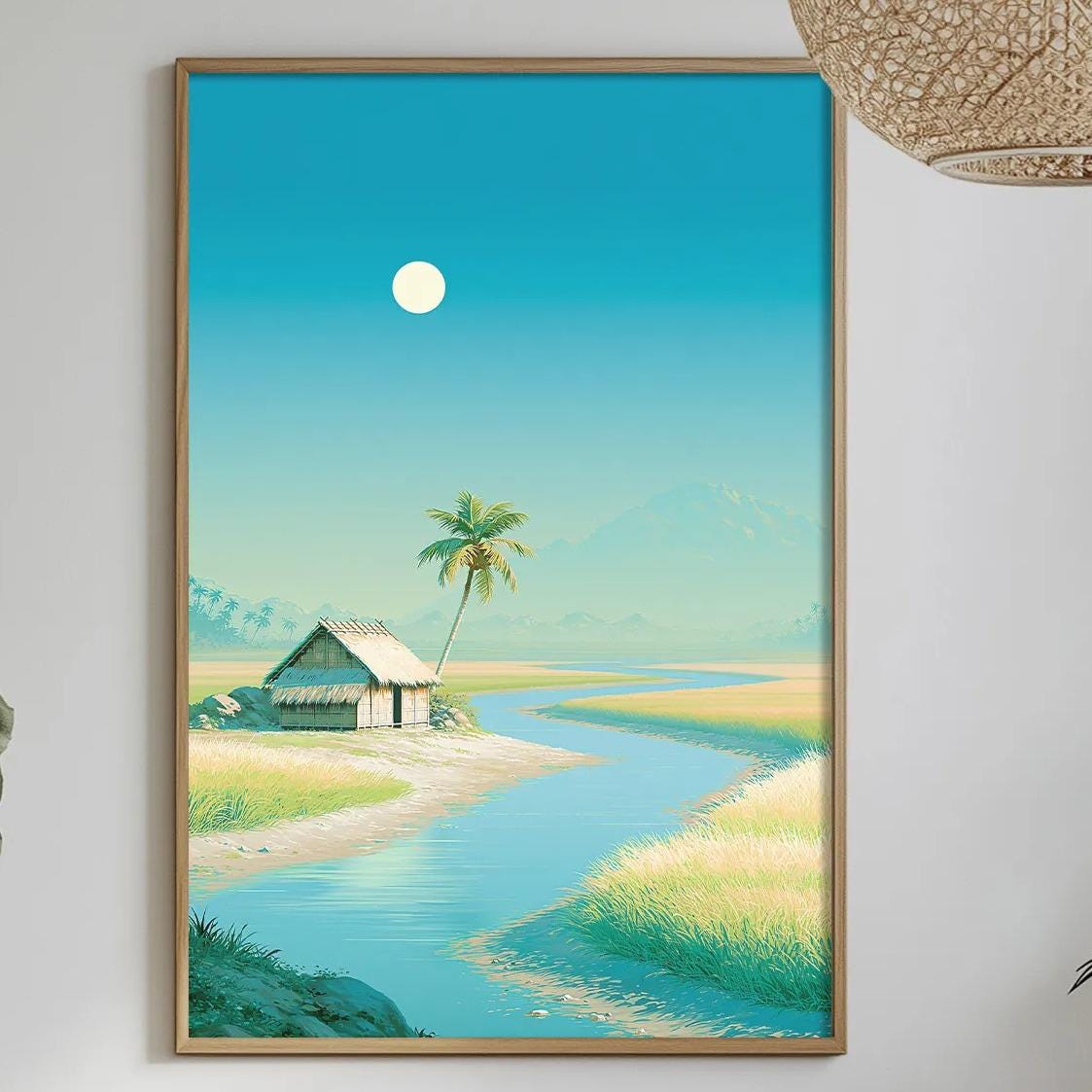 a serene tropical landscape with a small house, palm trees, and a calm river, all set against a clear blue sky with a full moon. The scene is framed and hung on a wall, creating a peaceful and inviting atmosphere.