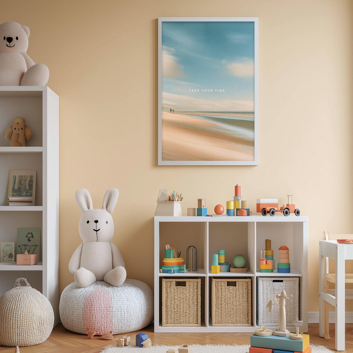 A cozy children's room with a white bookshelf, a plush rabbit, and a colorful toy box filled with toys. A framed beach scene is displayed on the wall, and a toy train is present on the shelf.