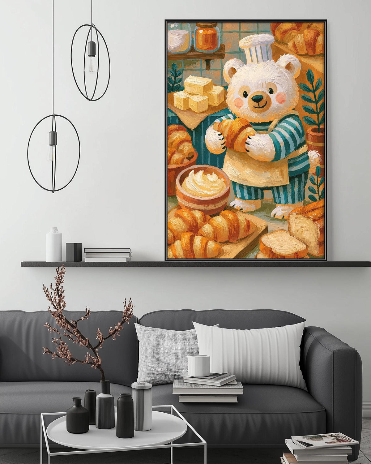 a cozy living room with a gray couch, a coffee table, and a large framed painting of a bear holding a loaf of bread. The painting is hanging on the wall above the couch, creating a warm and inviting atmosphere in the space.