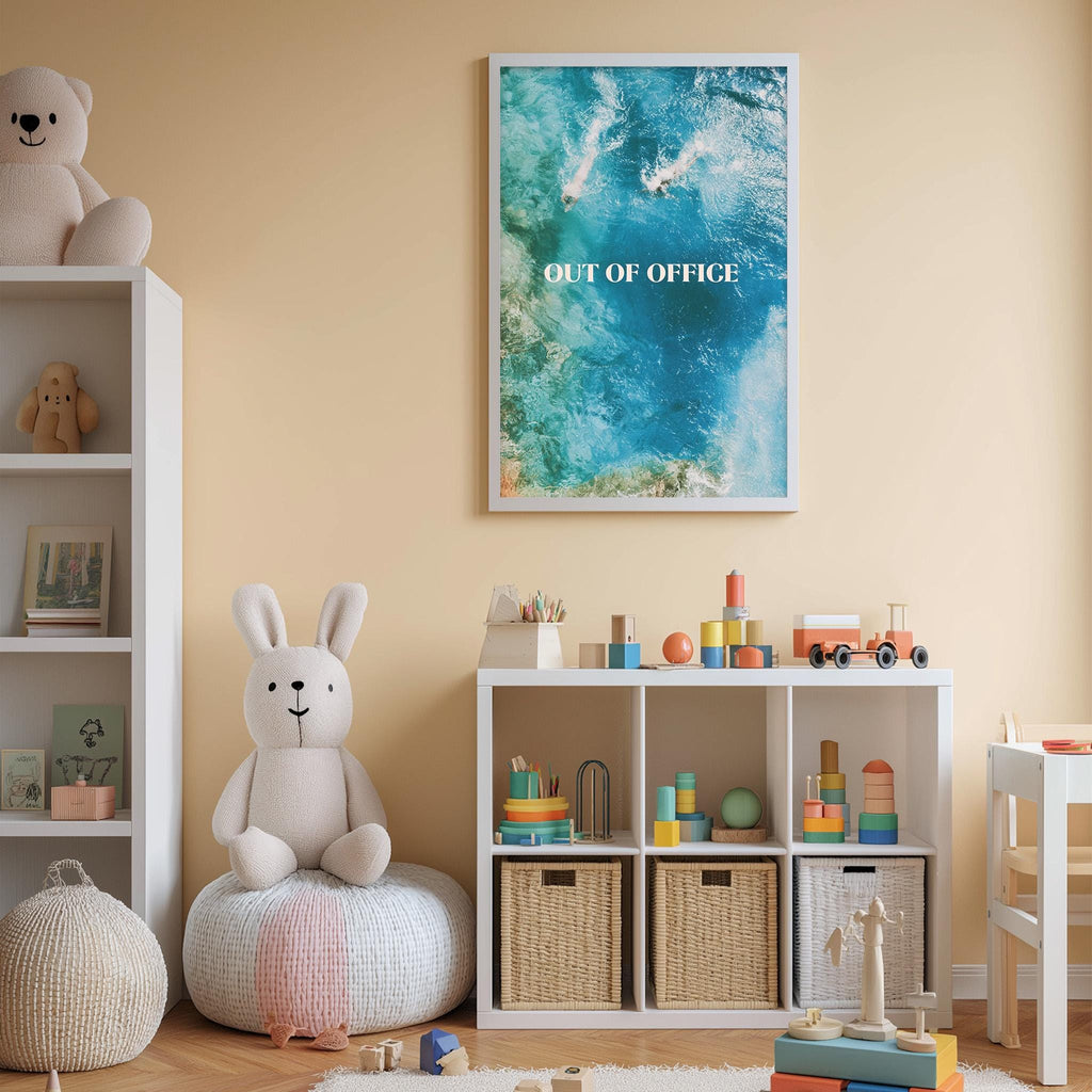 A child's bedroom with a white bookshelf, a stuffed rabbit, and a colorful toy box filled with toys. Above the bookshelf is a framed poster with the text "OUT OF OFFICE".