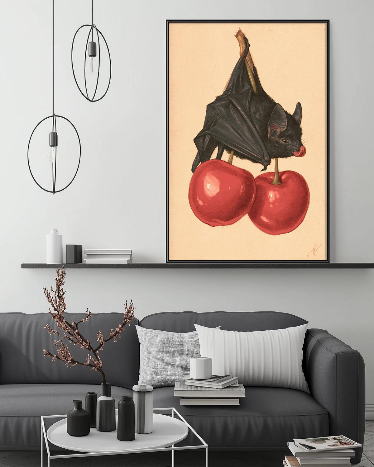 a black bat perched on two red cherries, with a minimalist and modern living room setting in the background.