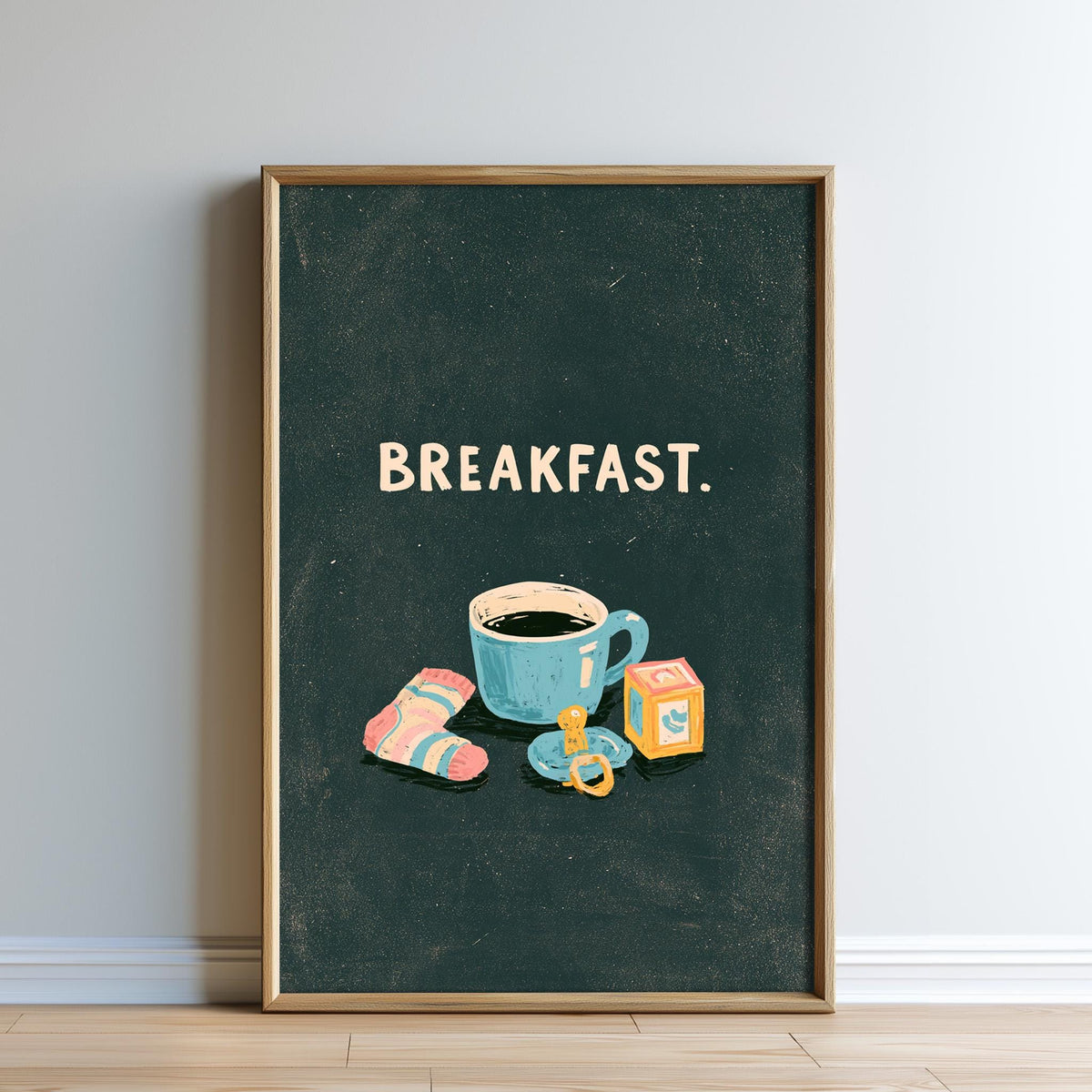 The image is a framed poster with a black background and a cup of coffee, along with a pair of socks and a baby bottle, all set against a dark green background.