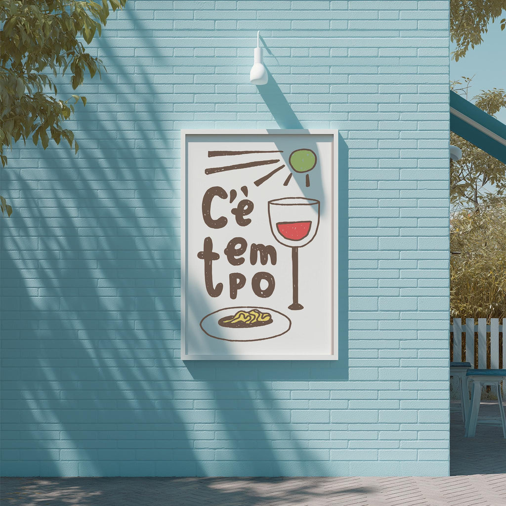 a poster with a blue background and white border, hanging on a wall. The poster has a drawing of a wine glass and some text, but the exact words are not clear.
