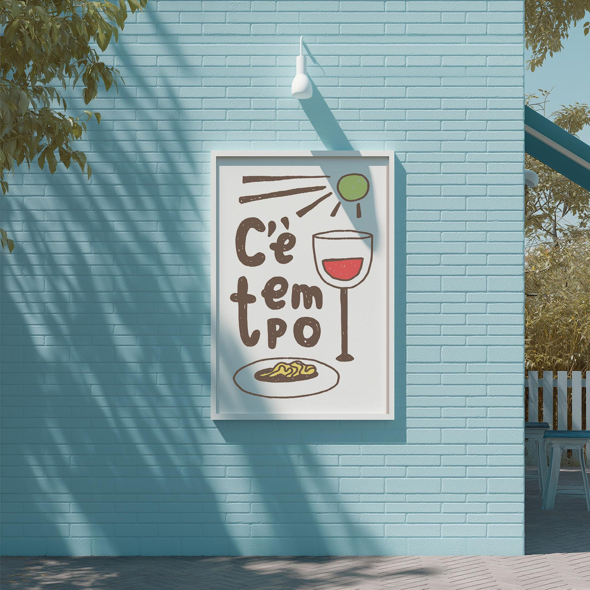 a poster with a blue background and white border, hanging on a wall. The poster has a drawing of a wine glass and some text, but the exact words are not clear.