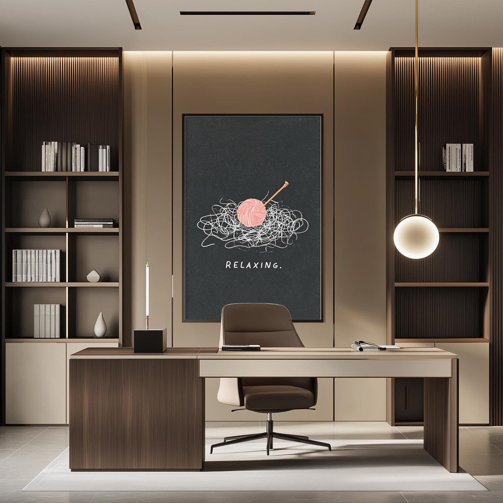 a modern and well-organized office space with a large black poster featuring a pink ball and a white yarn on the wall, along with a desk and chair.