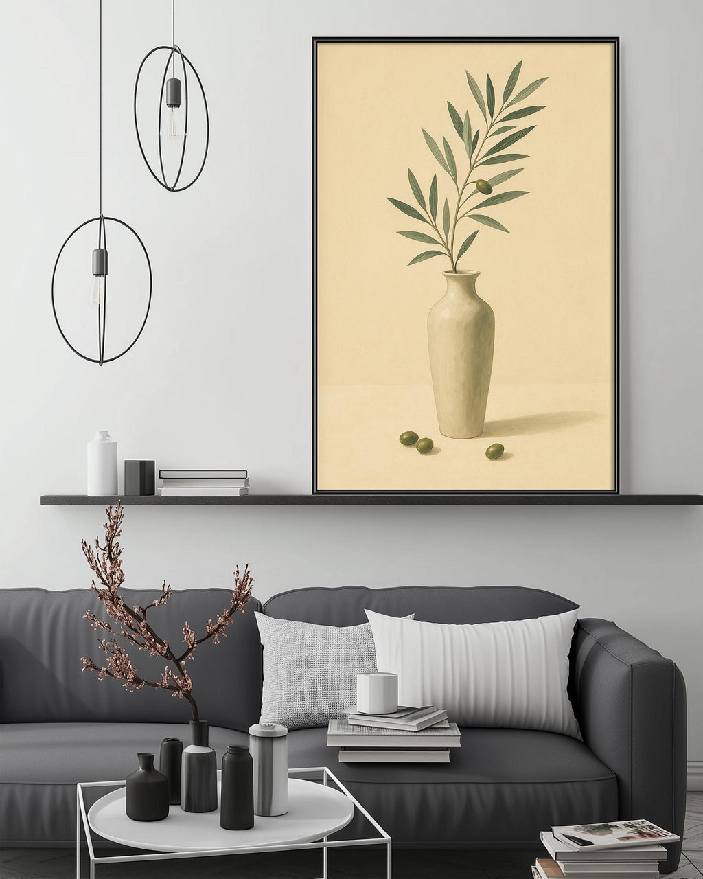 a living room with a gray sofa, a coffee table, and a large framed painting of a plant in a vase hanging on the wall above the sofa.