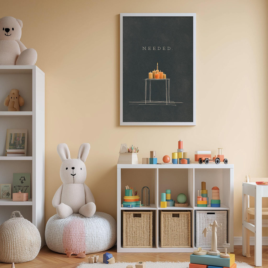 A cozy children's room with a white bookshelf, a plush rabbit, and a colorful toy box filled with toys. A framed poster with the word "NEEDED" is displayed on the wall above the bookshelf.
