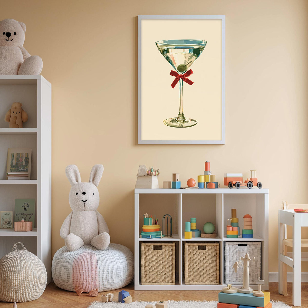 A child's bedroom with a white bookshelf, a stuffed rabbit, and a framed illustration of a martini glass on the wall.