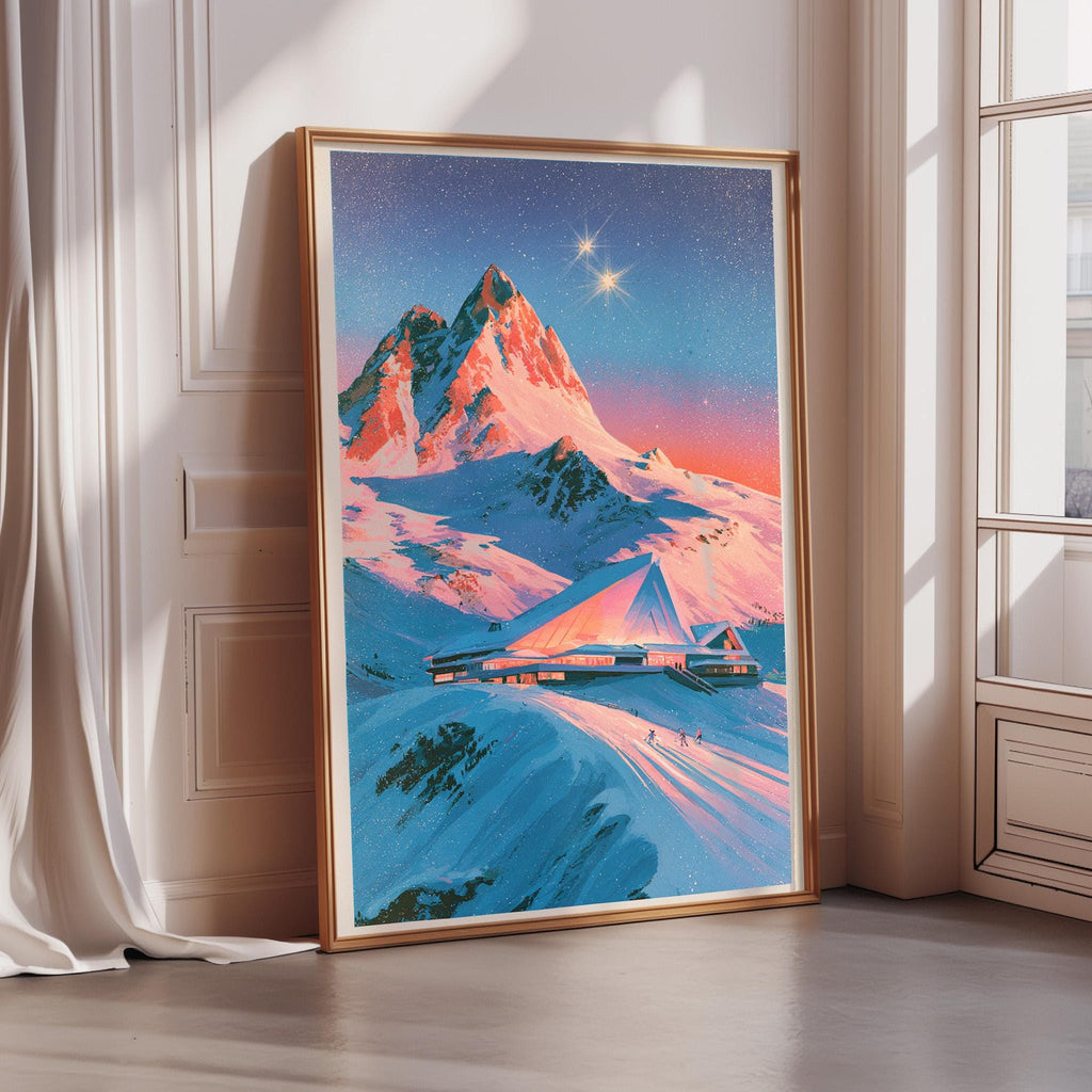A large framed painting depicting a snowy mountain landscape with a ski lodge in the distance, set against a starry night sky.