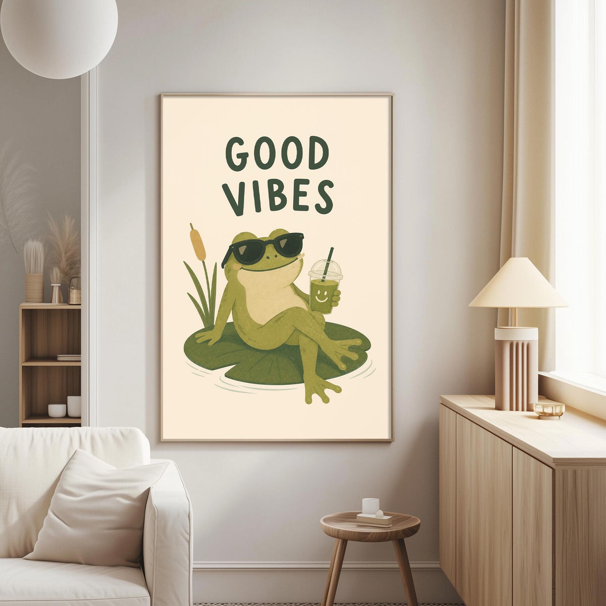 a poster of a frog sitting on a lily pad, wearing sunglasses and holding a drink, with the text "GOOD VIBES" above it.