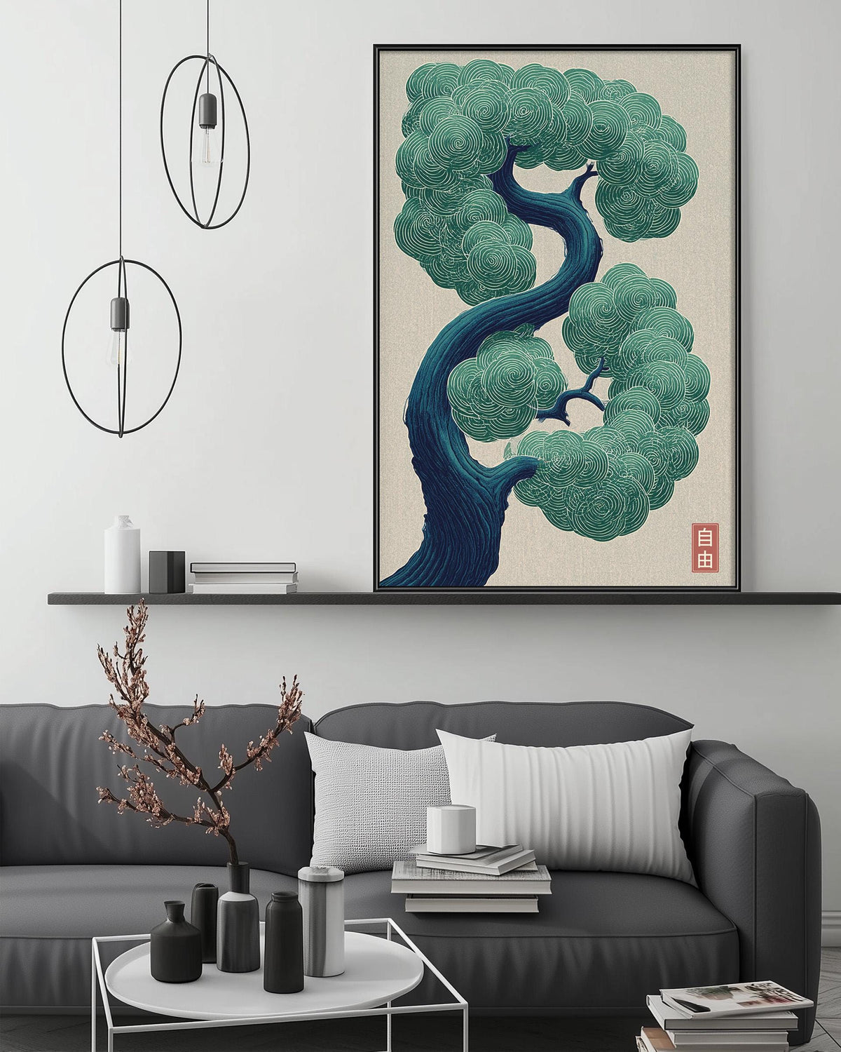 a modern living room with a gray sofa, a coffee table, and a large framed illustration of a tree with a blue trunk and green leaves hanging on the wall above the sofa.