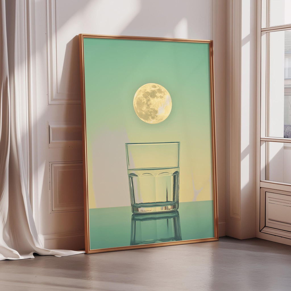 a large framed poster with a glass of water and a full moon in the background.