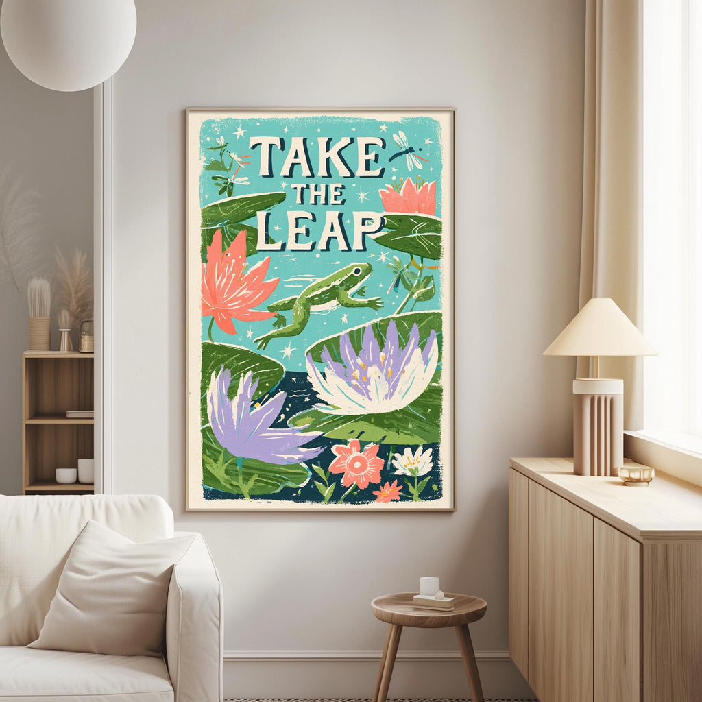 a poster with a frog and flowers hanging on a wall in a living room.