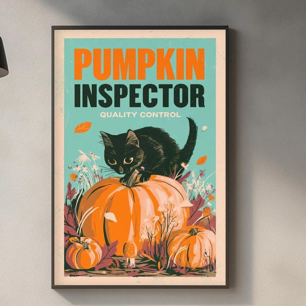 a framed poster of a black cat sitting on a pumpkin, with the text "PUMPKIN INSPECTOR QUALITY CONTROL" displayed prominently.