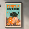 a framed poster of a black cat sitting on a pumpkin, with the text "PUMPKIN INSPECTOR QUALITY CONTROL" displayed prominently.