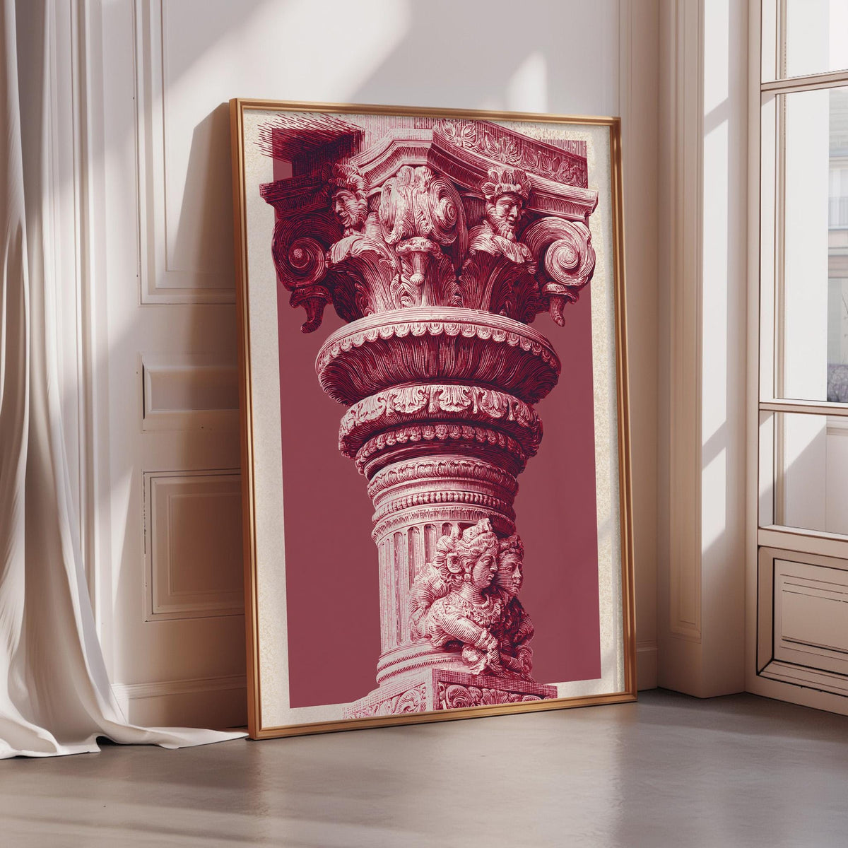 A large, ornate, and intricately decorated column or pillar is displayed in a framed artwork, which is placed on a wall in a room with a window.