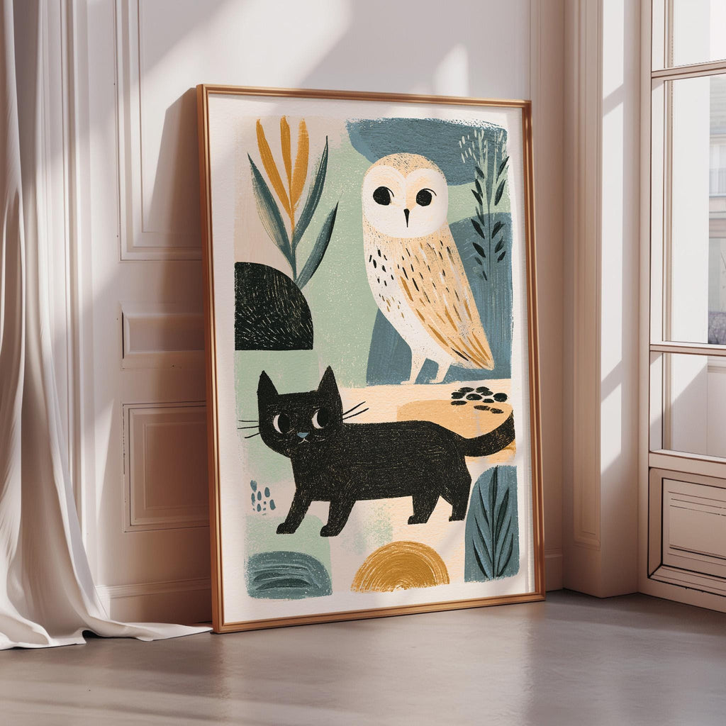 a framed artwork depicting an owl and a black cat, with various abstract elements and shapes surrounding them.