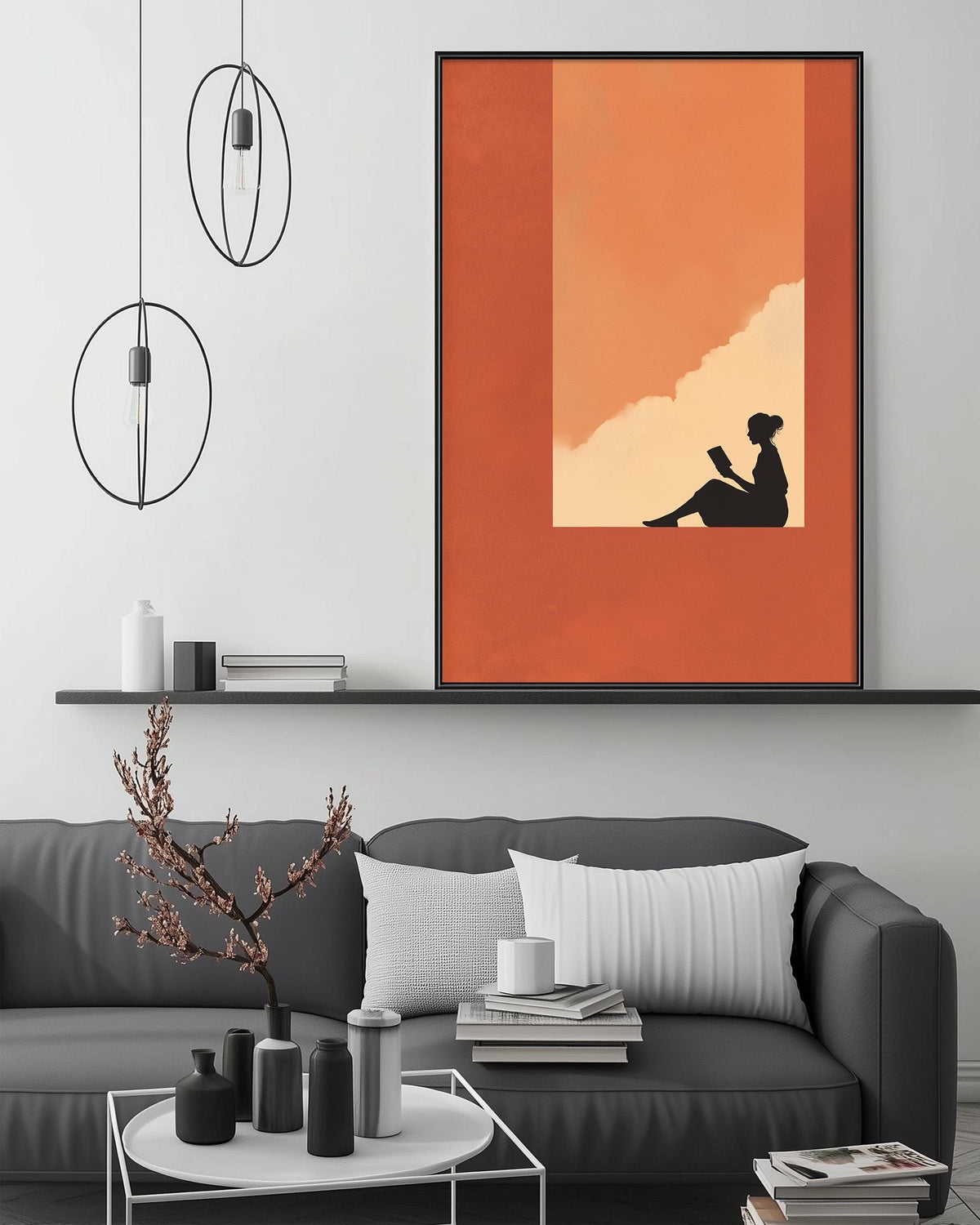 a modern living room with a gray sofa, a coffee table, and a large orange and black abstract painting hanging on the wall above the sofa.