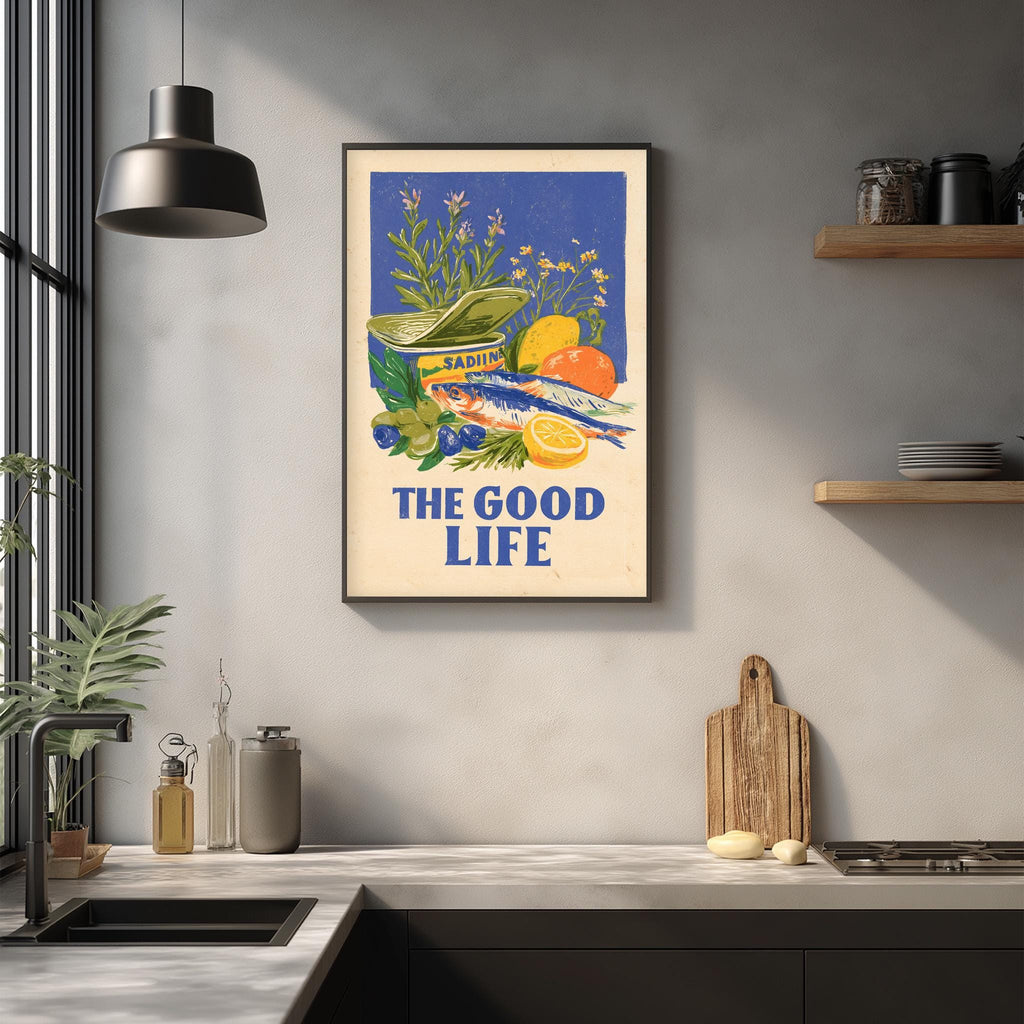 a framed poster with a vibrant illustration of various fruits and vegetables, including a fish, hanging on a wall above a kitchen counter.