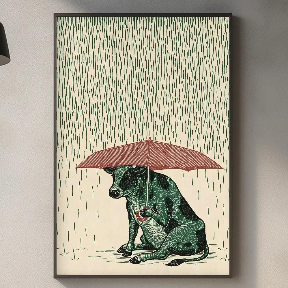a framed illustration of a dog sitting under an umbrella, with a green background and a red umbrella.