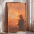 a large framed painting depicting a silhouette of a person standing in front of a sunset.