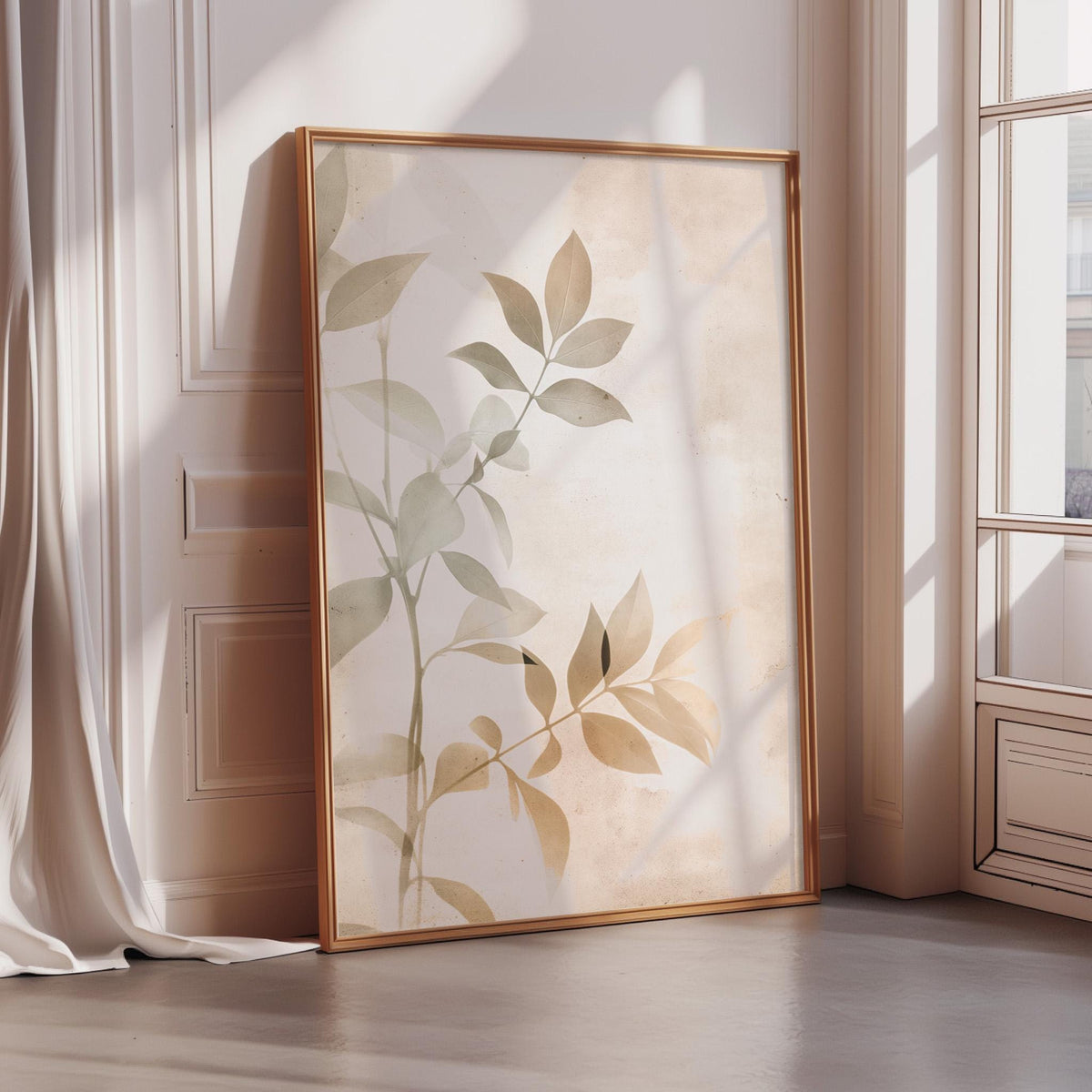 a large framed print of a plant with green leaves, placed on a wooden floor in a room with a window.