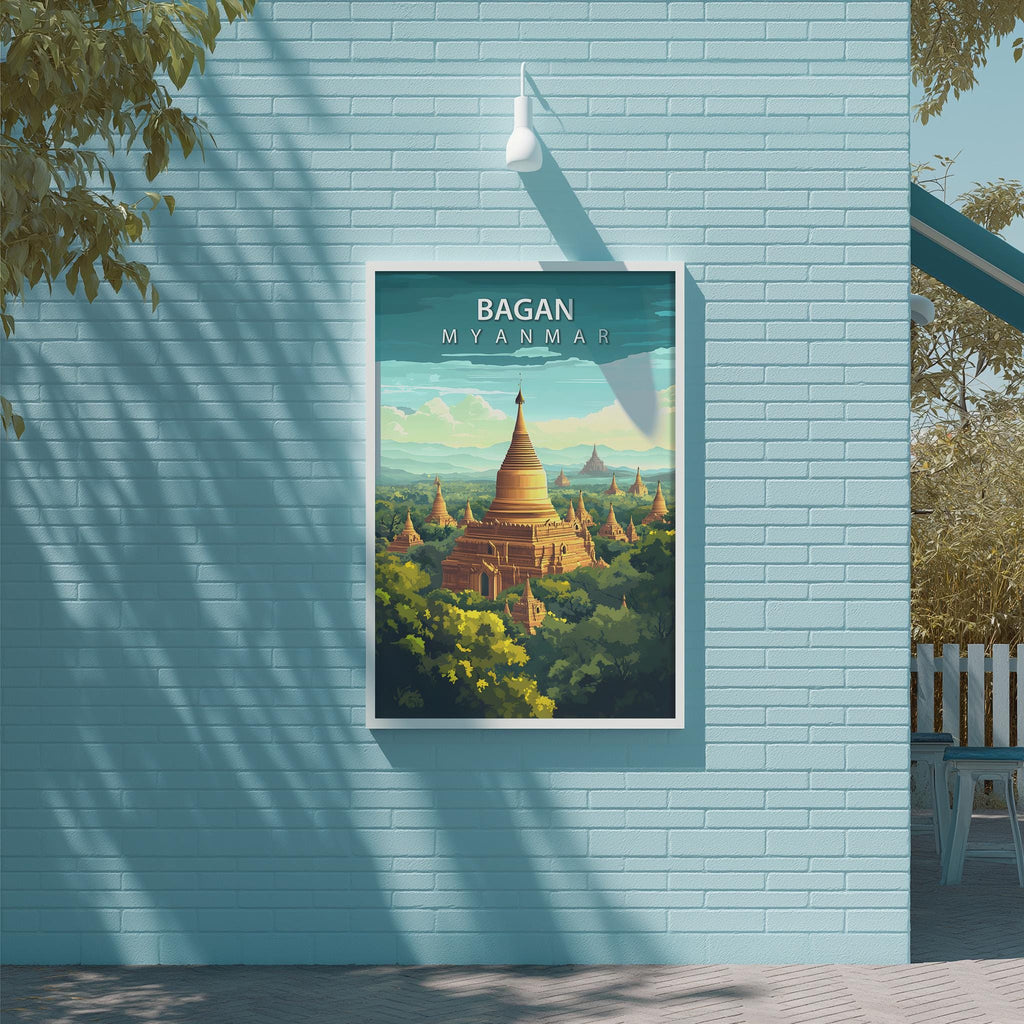 a poster of the Bagan temple in Myanmar, with a blue brick wall as the backdrop.