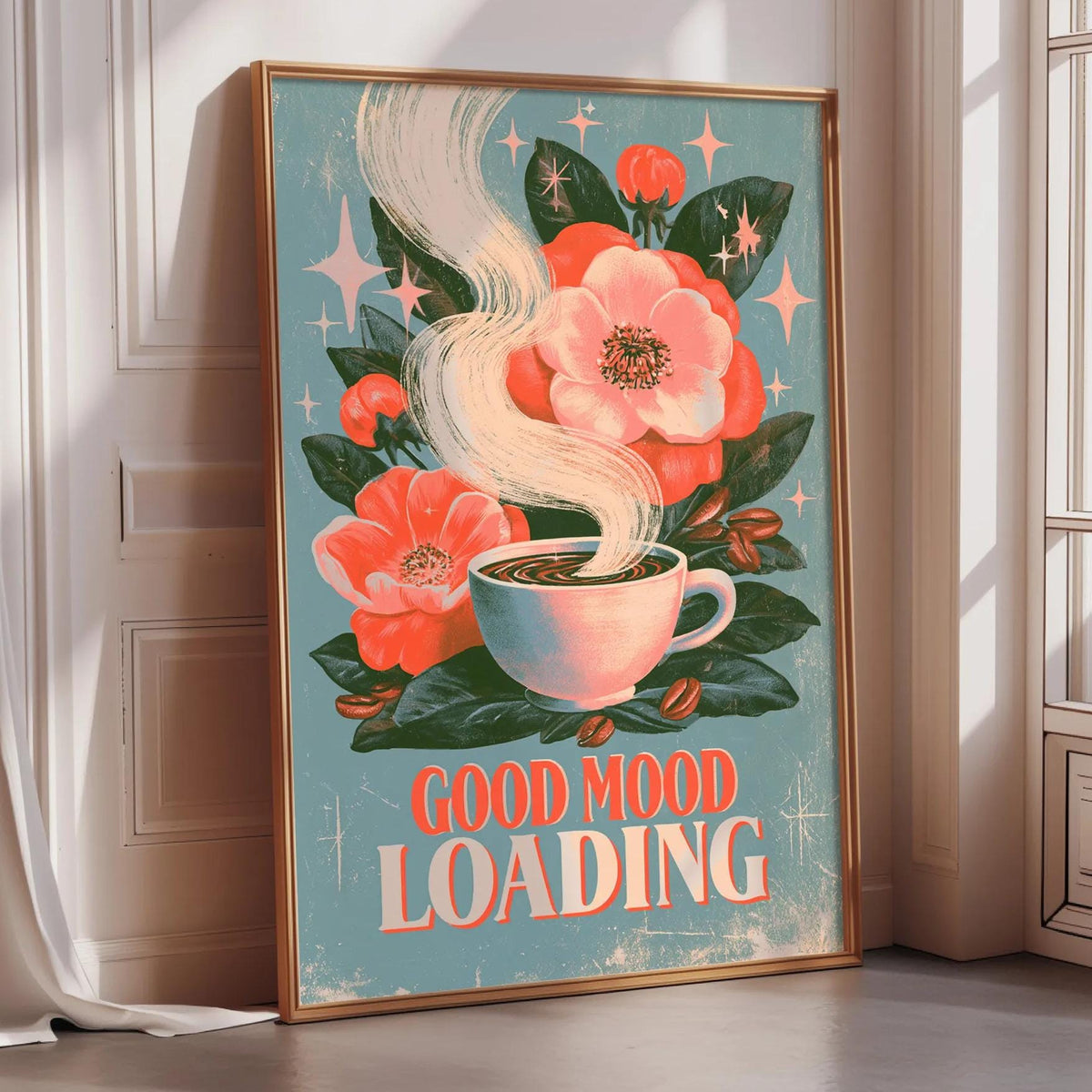 A framed poster with a floral design and a cup of coffee, along with the text "GOOD MOOD LOADING"