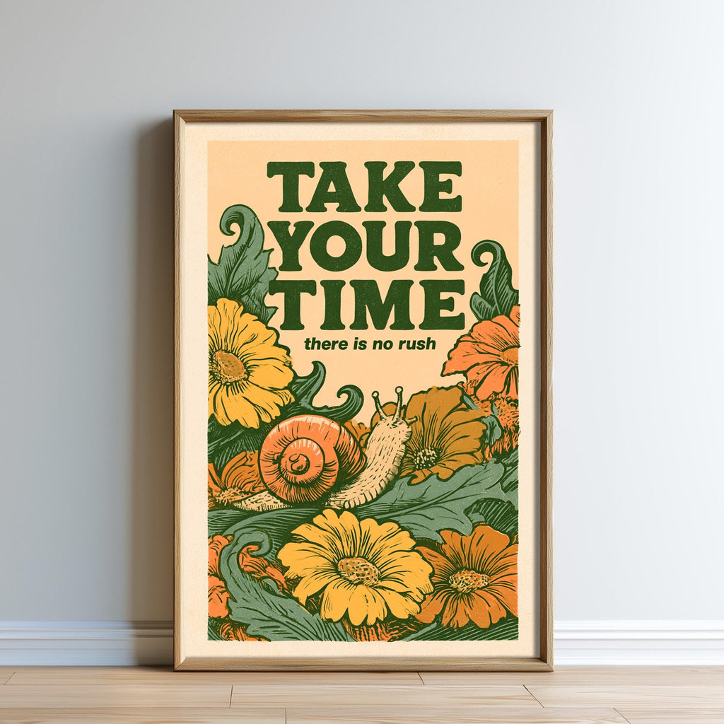 The image is a framed poster with a floral design and the text "TAKE YOUR TIME there is no rush" displayed prominently.