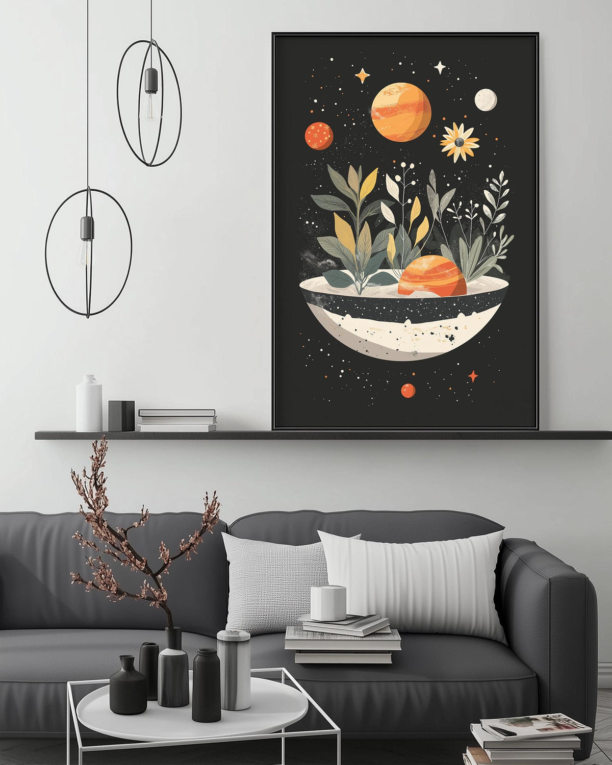 a modern living room with a gray sofa, a coffee table, and a large framed artwork depicting a celestial scene with orange planets, flowers, and stars.