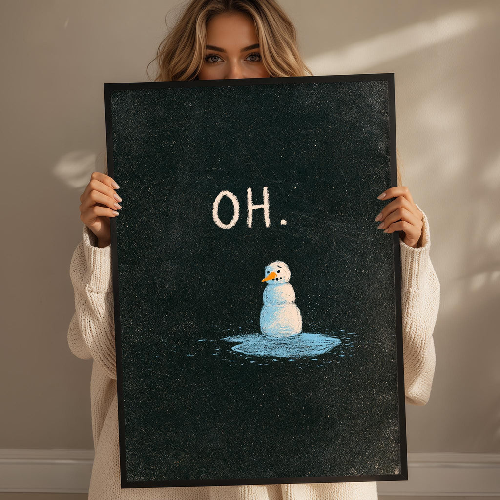A woman holding a blackboard with a snowman drawn on it.