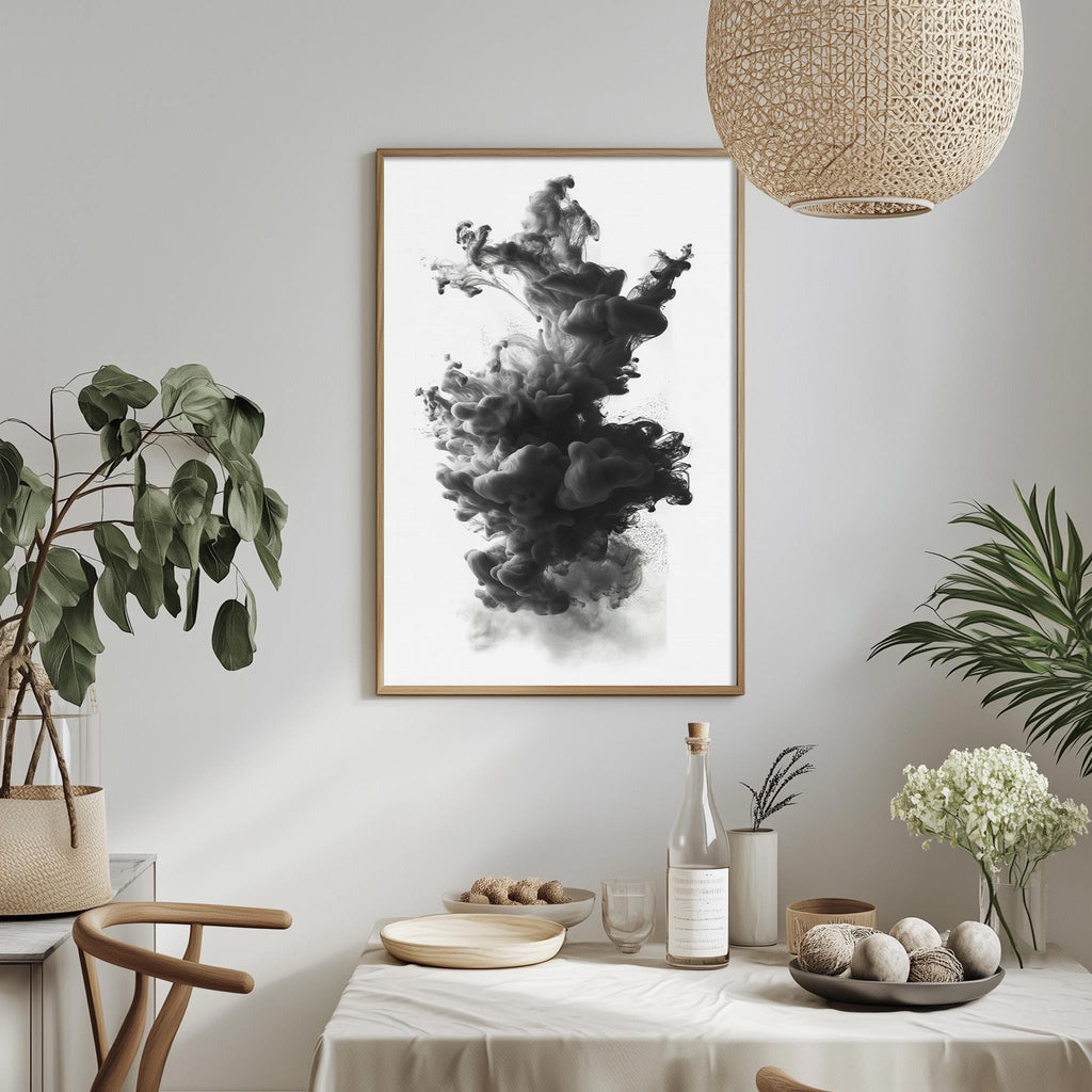 a minimalist dining room with a white tablecloth, a framed black and white abstract artwork hanging on the wall, and various decorative elements such as potted plants, vases, and a bowl of fruit.