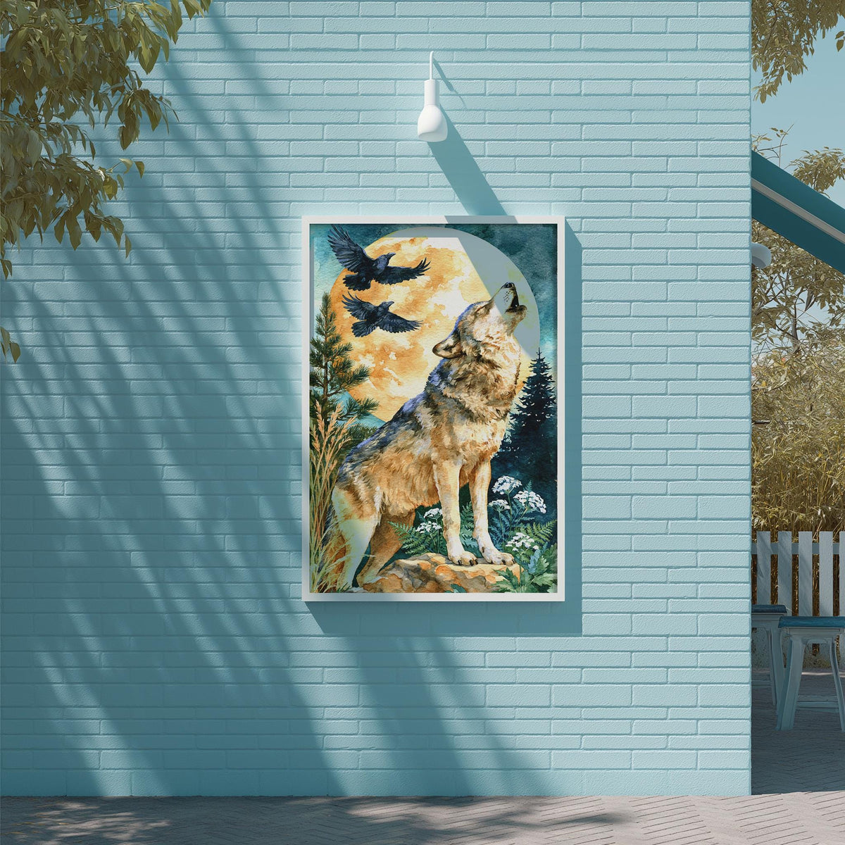 a painting of a wolf howling at the moon, hanging on a blue wall.