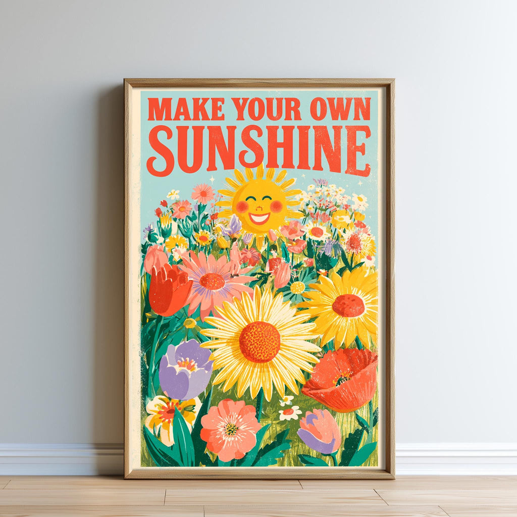 The image is a framed poster with a vibrant illustration of a sunflower surrounded by various colorful flowers. The text on the poster reads "MAKE YOUR OWN SUNSHINE".