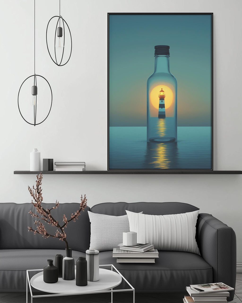 a large framed artwork depicting a lighthouse inside a glass bottle, set against a serene ocean scene with a sunset. The artwork is displayed on a wall above a gray couch, which has a coffee table in front of it. The room has a minimalist and modern design, with pendant lights hanging above the couch and a shelf below the artwork.