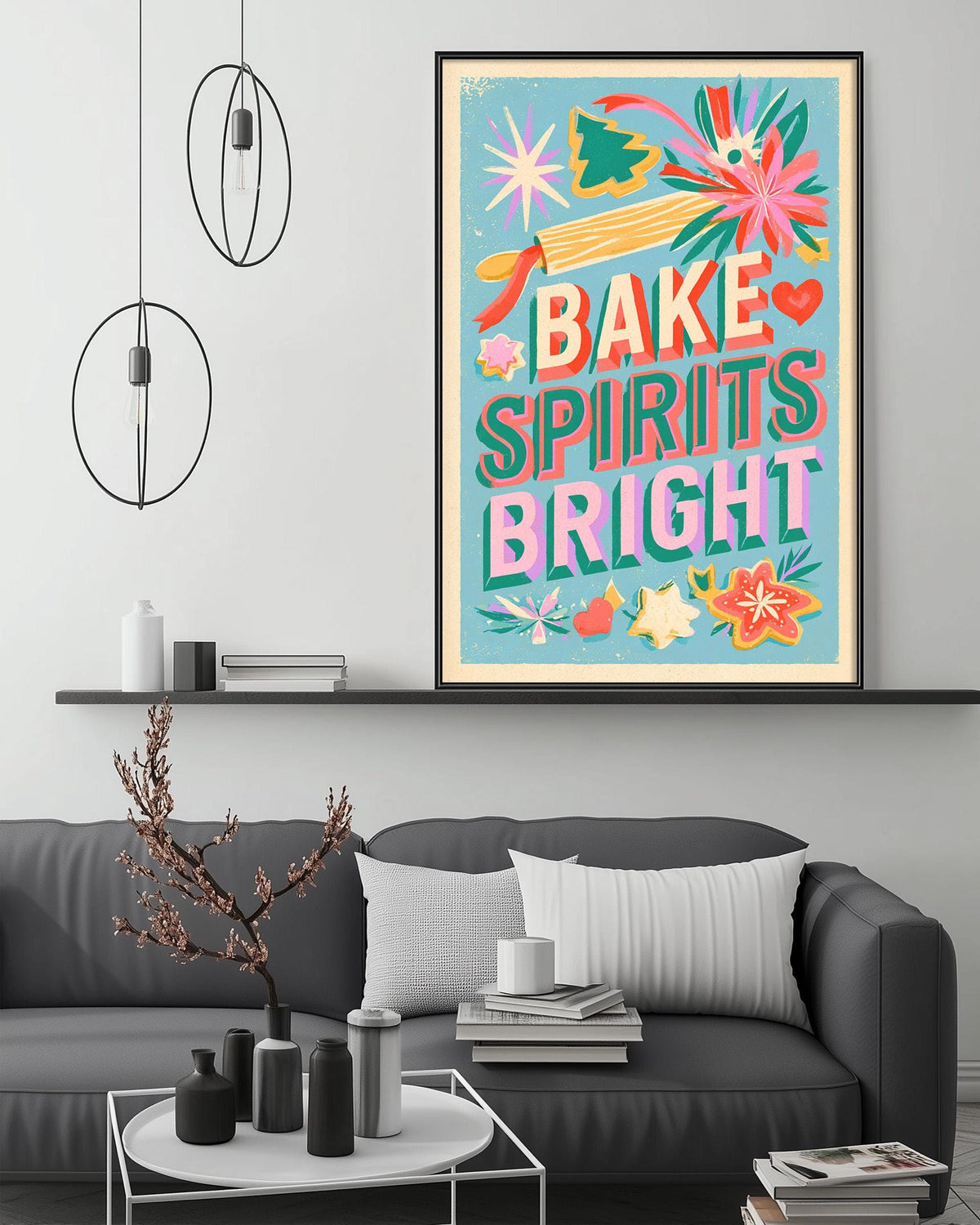 a living room with a gray couch, a coffee table, and a large framed poster with a colorful design hanging on the wall above the couch.