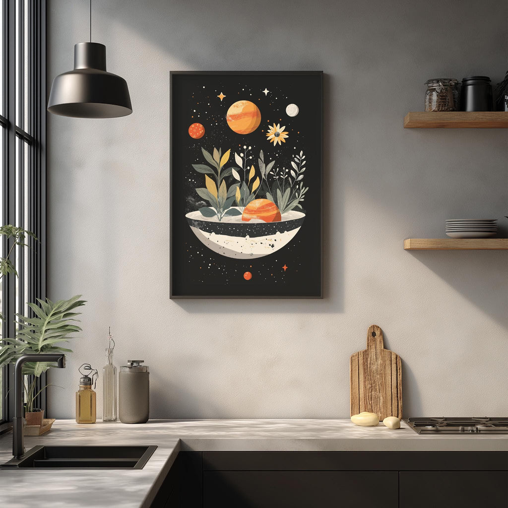 a kitchen counter with various kitchen items, including a cutting board, a sink, and a potted plant. Above the counter, there is a framed artwork depicting a bowl filled with plants and flowers, along with a planet and stars in the background.