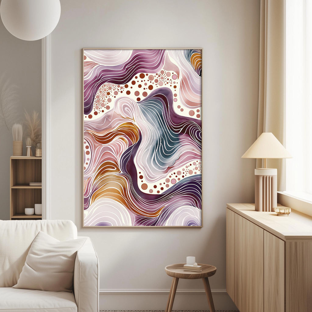 a large abstract painting hanging on a wall in a living room. The painting has a vibrant and colorful design with swirling patterns and shapes in shades of purple, pink, and orange. The room has a white sofa, a wooden side table, and a lamp on a table next to the sofa.