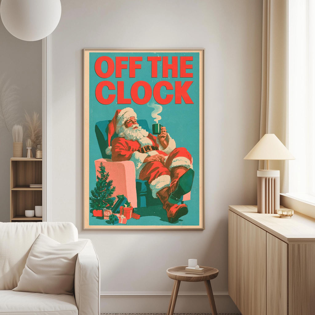 a poster of Santa Claus sitting in a chair, holding a cup of coffee, with the text "OFF THE CLOCK" written above him.