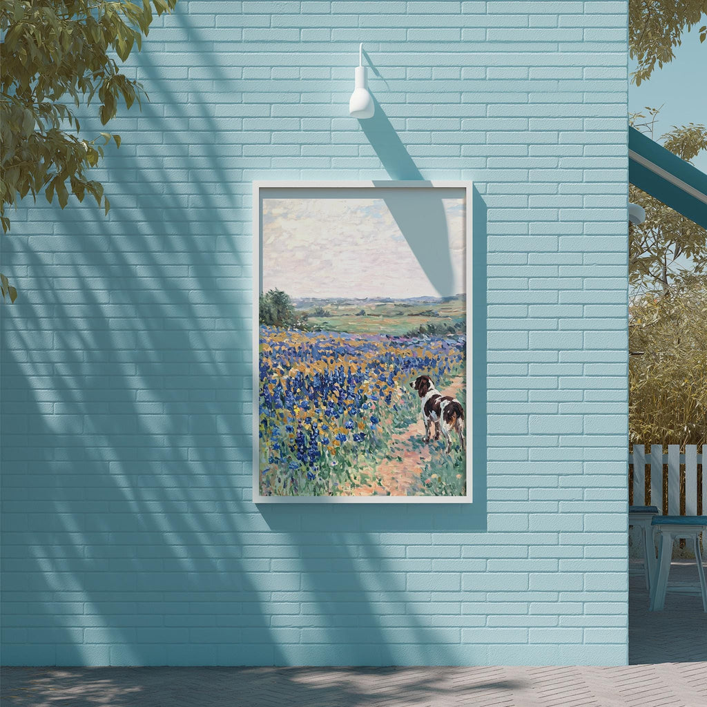 a blue brick wall with a framed painting of a dog in a field of flowers hanging on it.