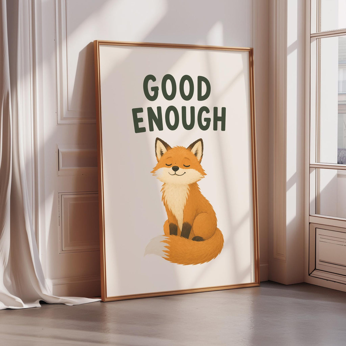 A framed poster with a cartoon image of a smiling fox and the text "GOOD ENOUGH" on it.