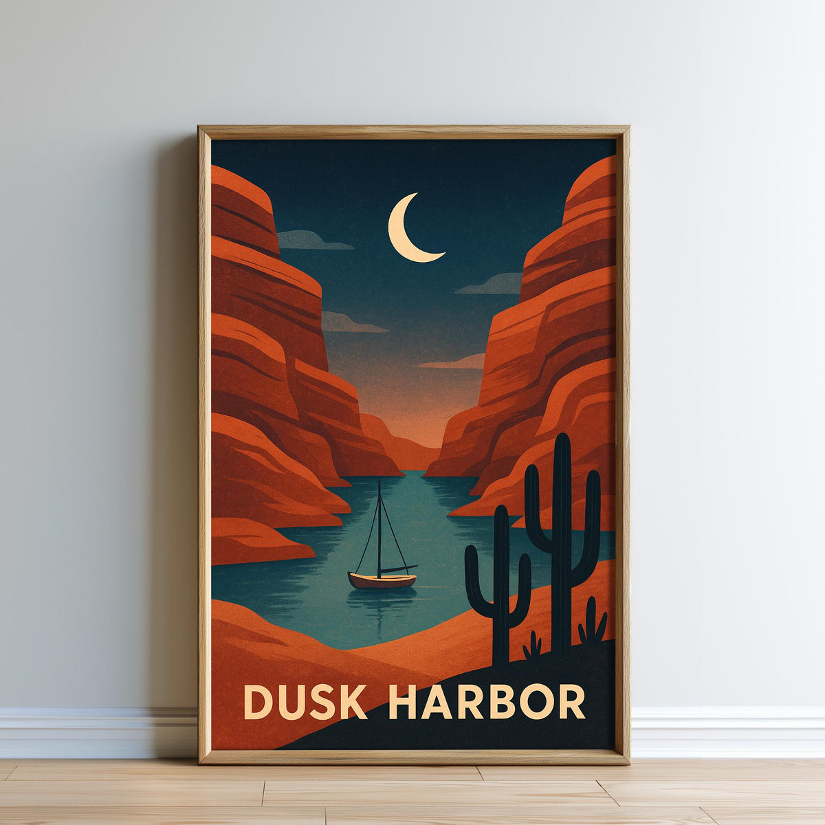 A framed poster depicting a serene desert landscape with a crescent moon, a sailboat on a lake, and a desert canyon in the background.
