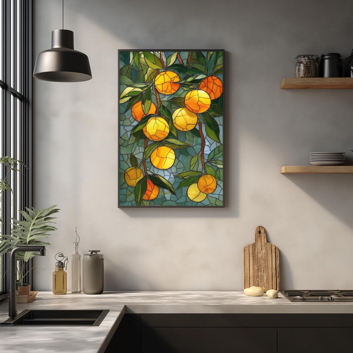 a kitchen counter with a framed stained glass artwork of oranges hanging on the wall above it. The artwork is a vibrant display of orange and green hues, creating a lively and colorful atmosphere in the kitchen.