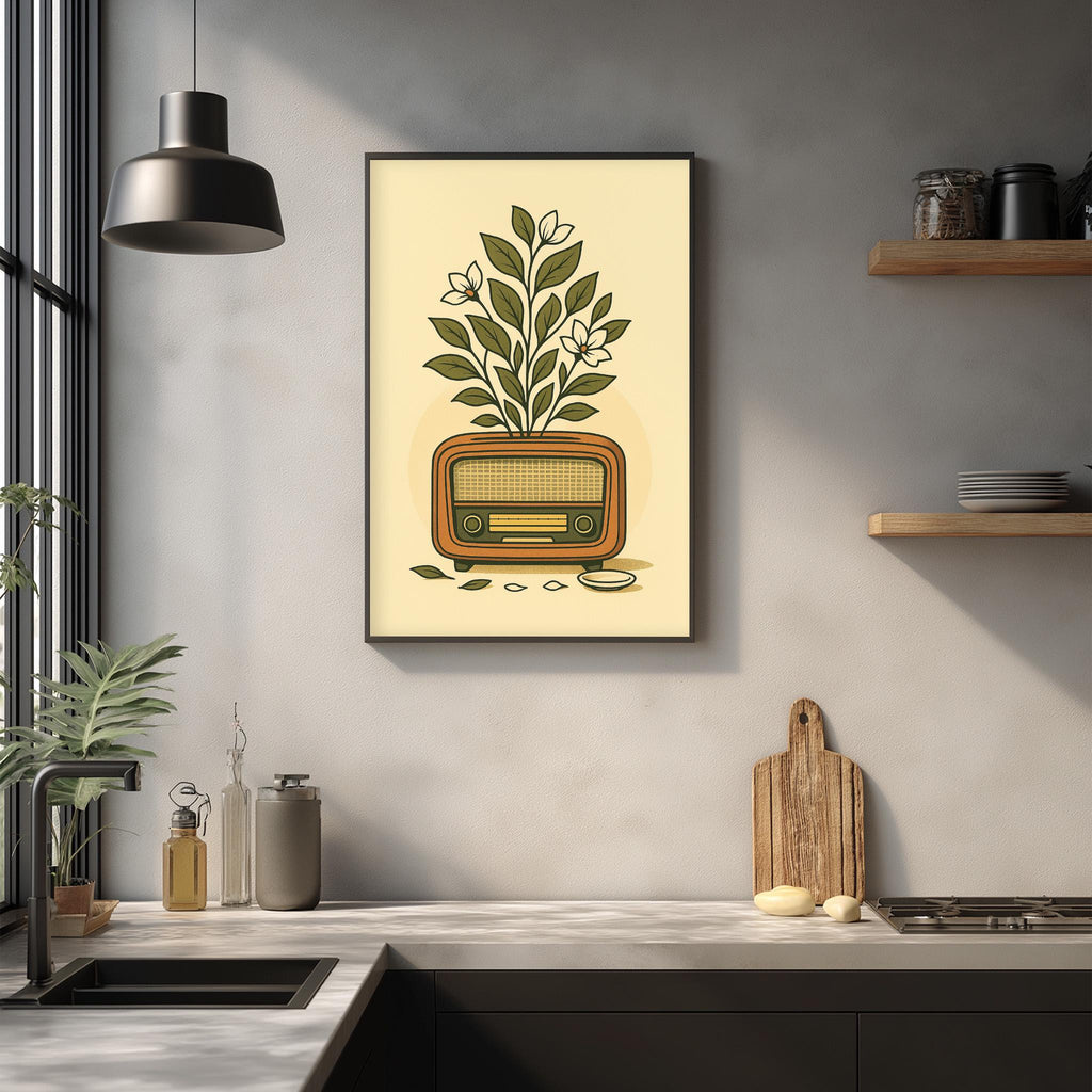 a kitchen counter with various items, including a framed illustration of a radio, a cutting board, and a potted plant.