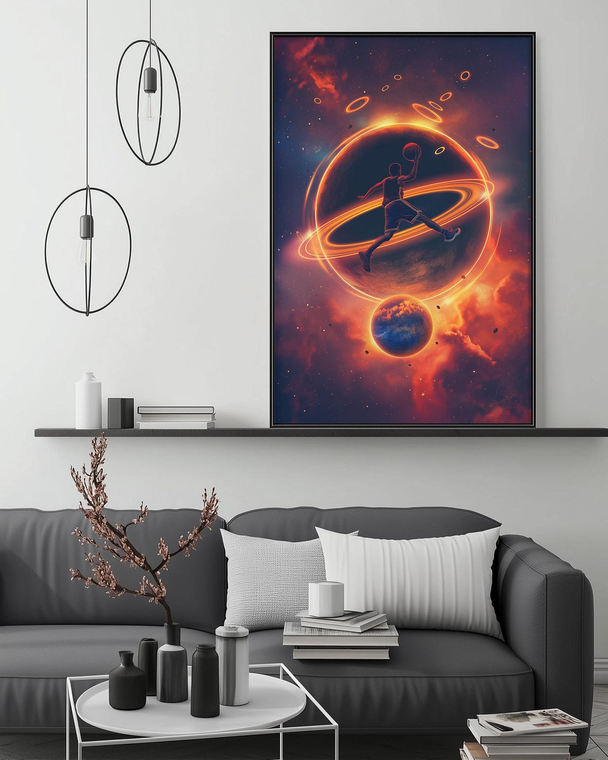a large, colorful painting of a person in mid-jump against a backdrop of a cosmic scene, including planets and stars. The painting is displayed on a wall above a gray couch, which is positioned in front of a coffee table. The room has a minimalist and modern design, with a shelf holding various decorative items and a pendant light hanging above the couch.