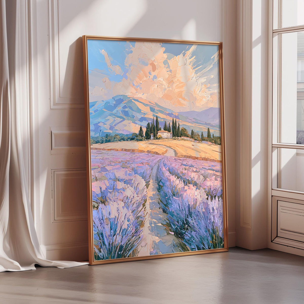 A large framed painting depicting a picturesque landscape with a winding path leading through a field of lavender flowers, set against a backdrop of mountains and a blue sky with clouds.