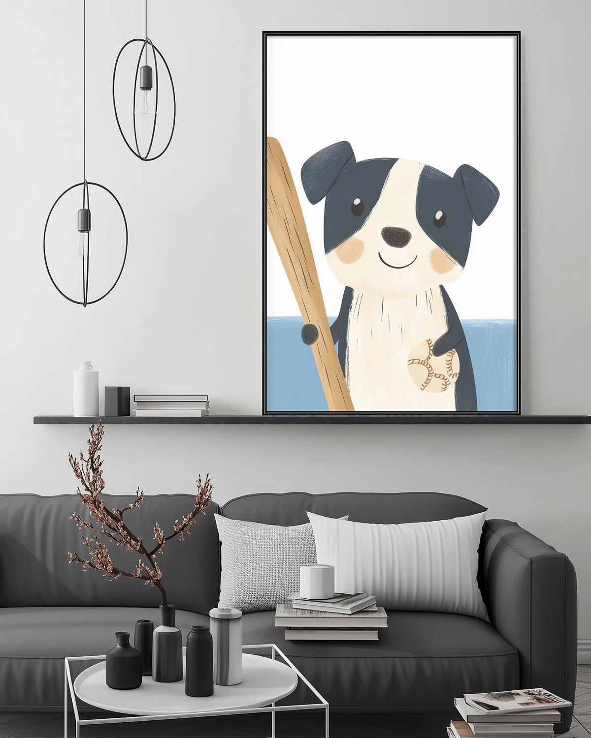 a cozy living room with a gray couch, a coffee table, and a framed illustration of a dog holding a surfboard. The room has a minimalist and modern design, with a white wall and a shelf displaying decorative items.