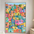 a vibrant, colorful painting of a cityscape, hanging on the wall of a living room.